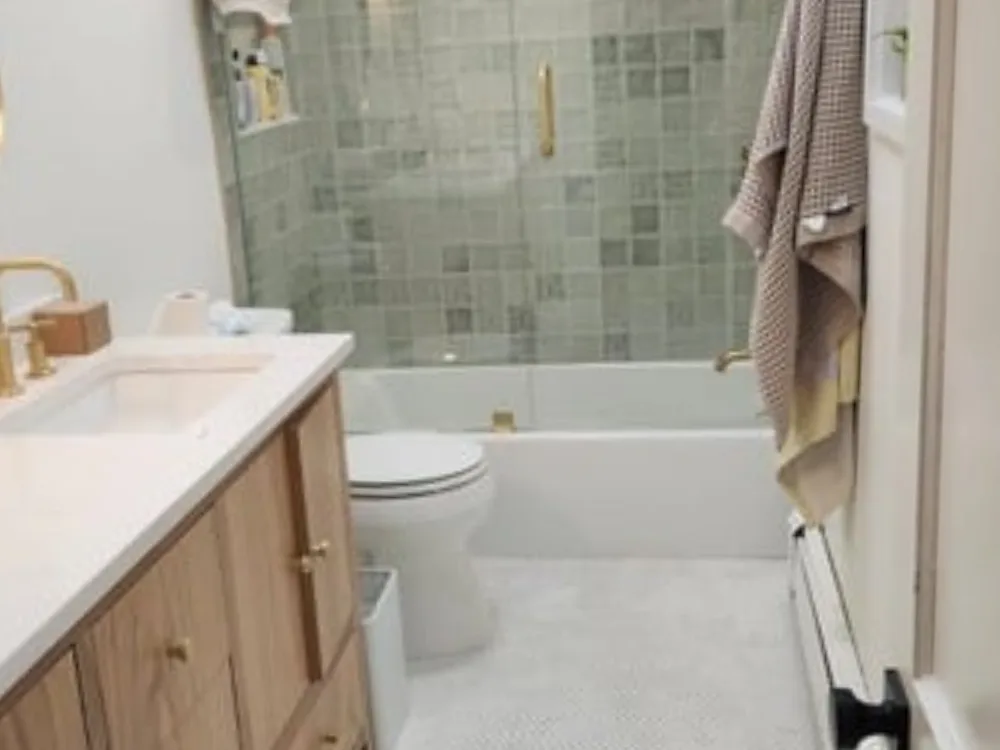 completed bathroom double sink remodel with modern finishes and fixtures