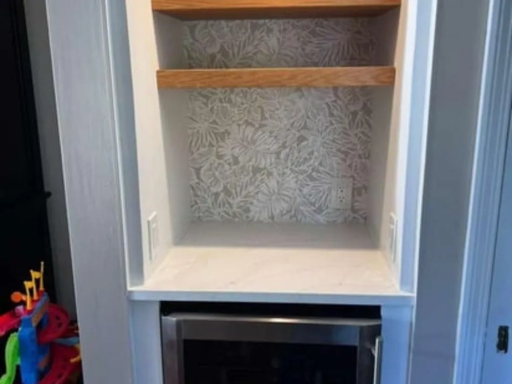 built-in bar niche upgrade featuring new lighting and shelves