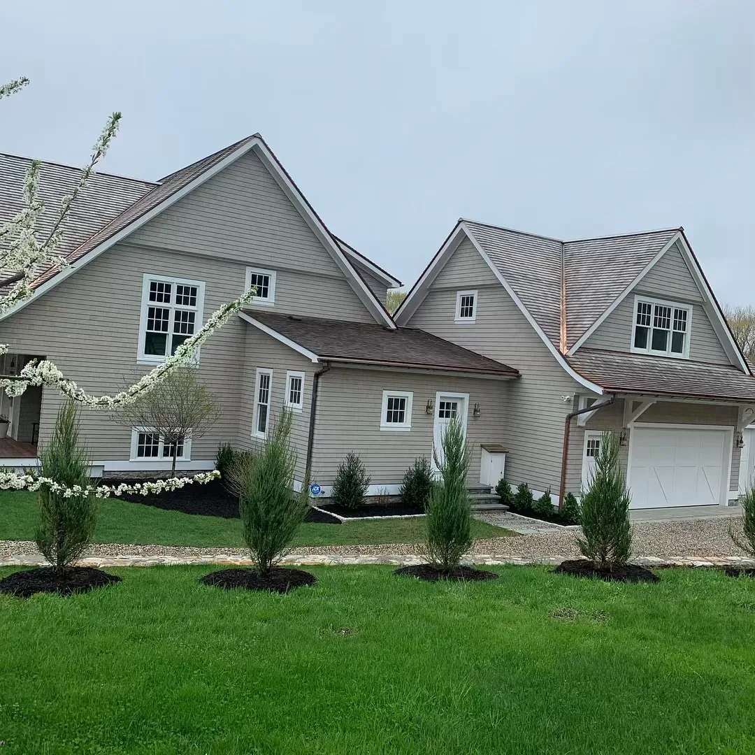 Exterior gable detailing on a classic home after receiving an expert power washing CT treatment.